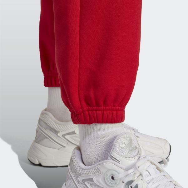 Adidas Pantalon De Jogging Polaire Essentials écarlate