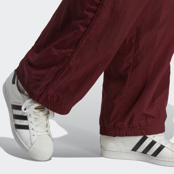 Pantalon De Survêtement En Nylon Premium Essentials Rouge Adidas