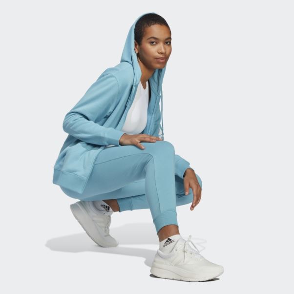 Adidas Essentials Linear Pantalon De Jogging En Molleton Resserré Aux Chevilles Bleu