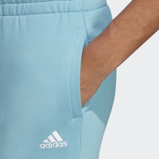 Adidas Essentials Linear Pantalon De Jogging En Molleton Resserré Aux Chevilles Bleu
