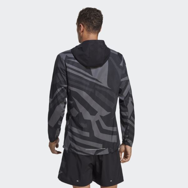 Posséder La Veste Saisonnière Run Adidas Noir