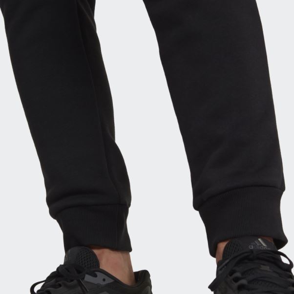 Adidas Pantalon Noir En Molleton Imprimé Camouflage Essentials