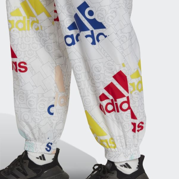 Pantalon Tissé Ample à Logo Multicolore Essentials Adidas Blanc