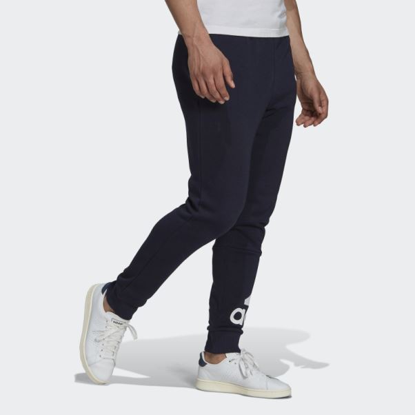 Pantalon Fuselé Logo Essentials En Polaire Encre Adidas