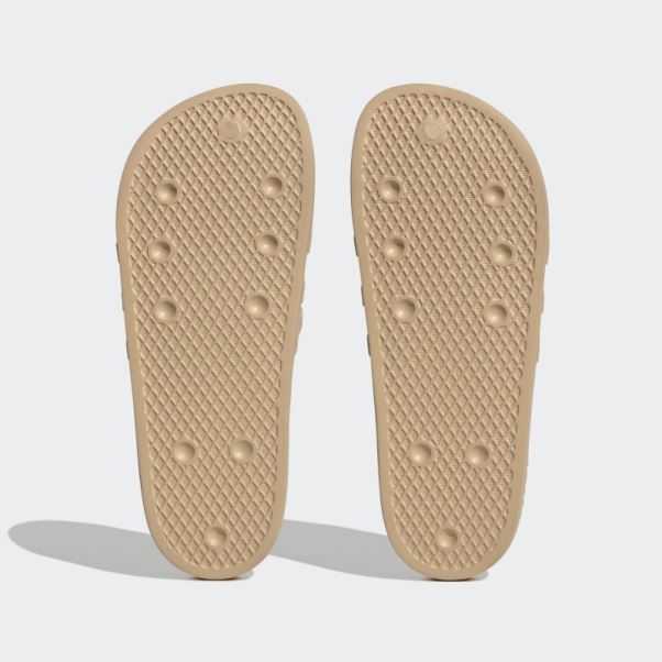 Claquettes Adifom Adilette Beiges Adidas