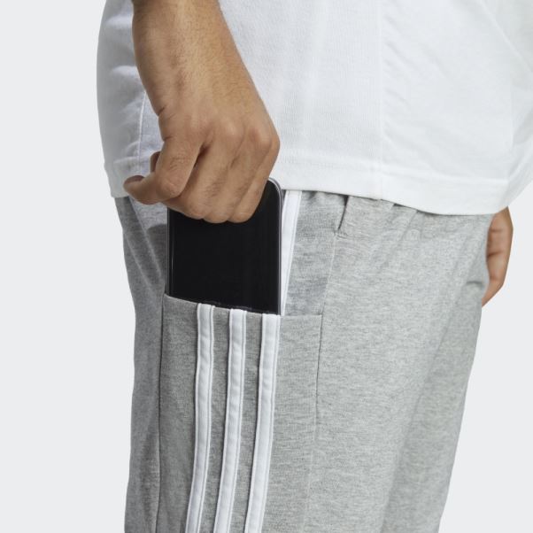 Pantalon Fuselé En Jersey Simple Essentiel à 3 Bandes Gris Moyen Adidas