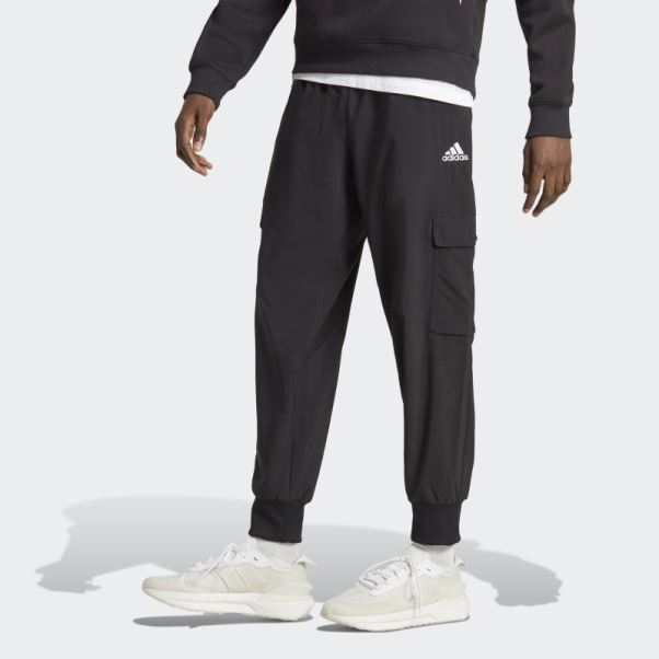 Pantalon Cargo Adidas Essentials Noir à Petit Logo Tissé à La Cheville
