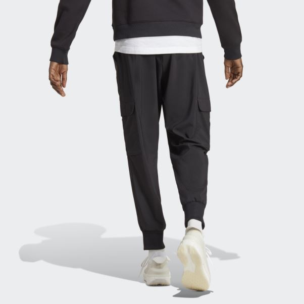 Pantalon Cargo Adidas Essentials Noir à Petit Logo Tissé à La Cheville