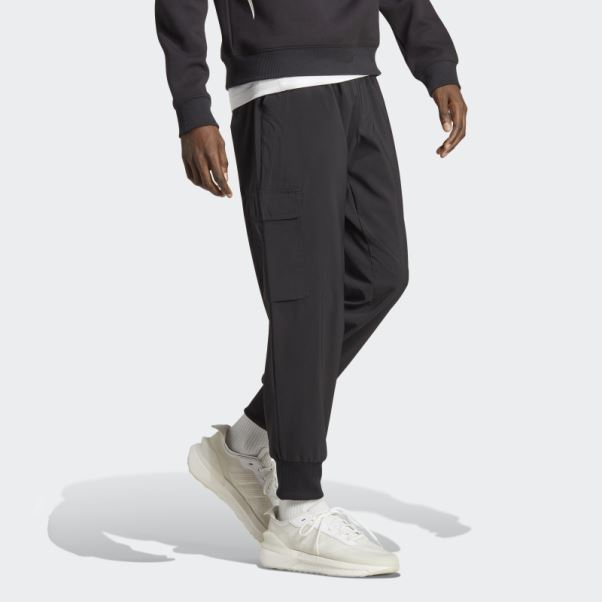 Pantalon Cargo Adidas Essentials Noir à Petit Logo Tissé à La Cheville