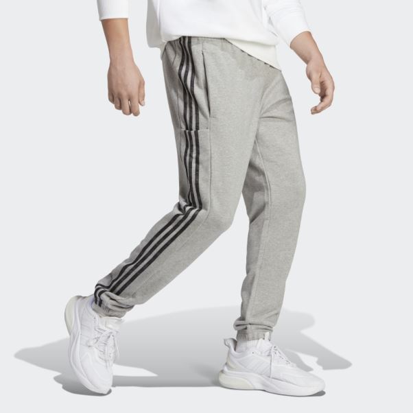 Pantalon Adidas Gris Moyen Essentials En Molleton Resserré Aux Poignets élastiques à 3 Bandes
