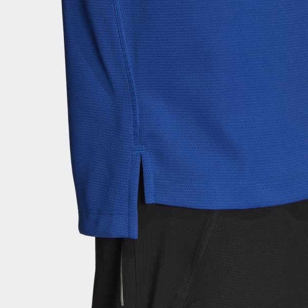 Adidas T-shirt Bleu Roi Imprimé à Impact Sur Le Devant Du Rack D'entraînement