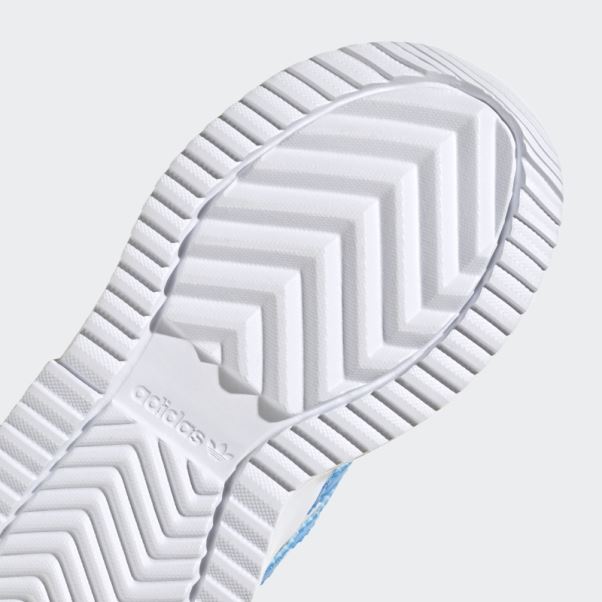 Chaussures Adidas Retropy F2 Blanches Et élégantes