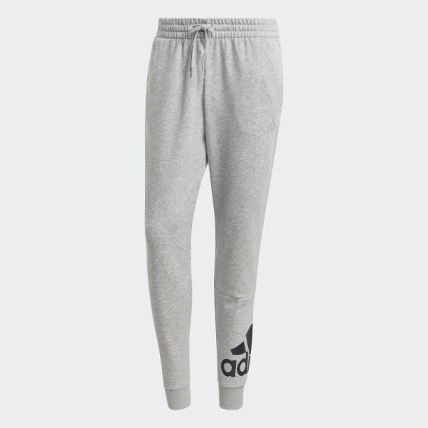 Pantalon Adidas Essentials En Molleton à Logo Fuselé Aux Poignets Adidas Gris Moyen